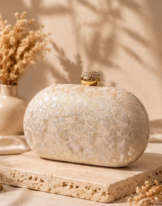Bianca Ivory Dome Clutch